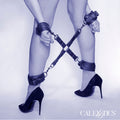 CALEXOTICS - NOCTURNAL HOG TIE CONNECTOR CUERO ADJUSTABLE BLACK